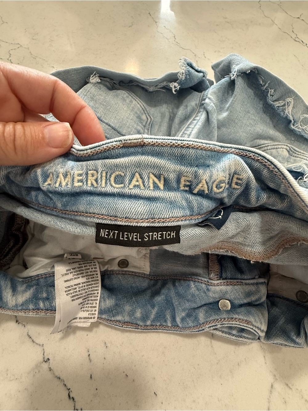 American Eagle Next Level Stretch Denim High Rise Light Wash Distressed Shorts 2 - Picture 4 of 5